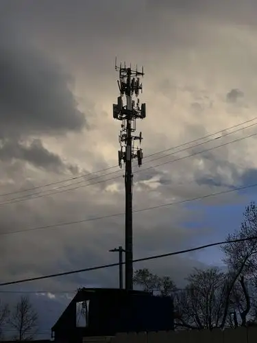 Towering tech against a dramatic sky.